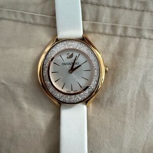 Swarovski Gold-Tone Watch with White Strap